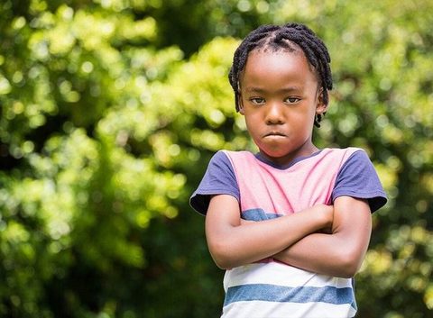 A child in a quiet, worried moment